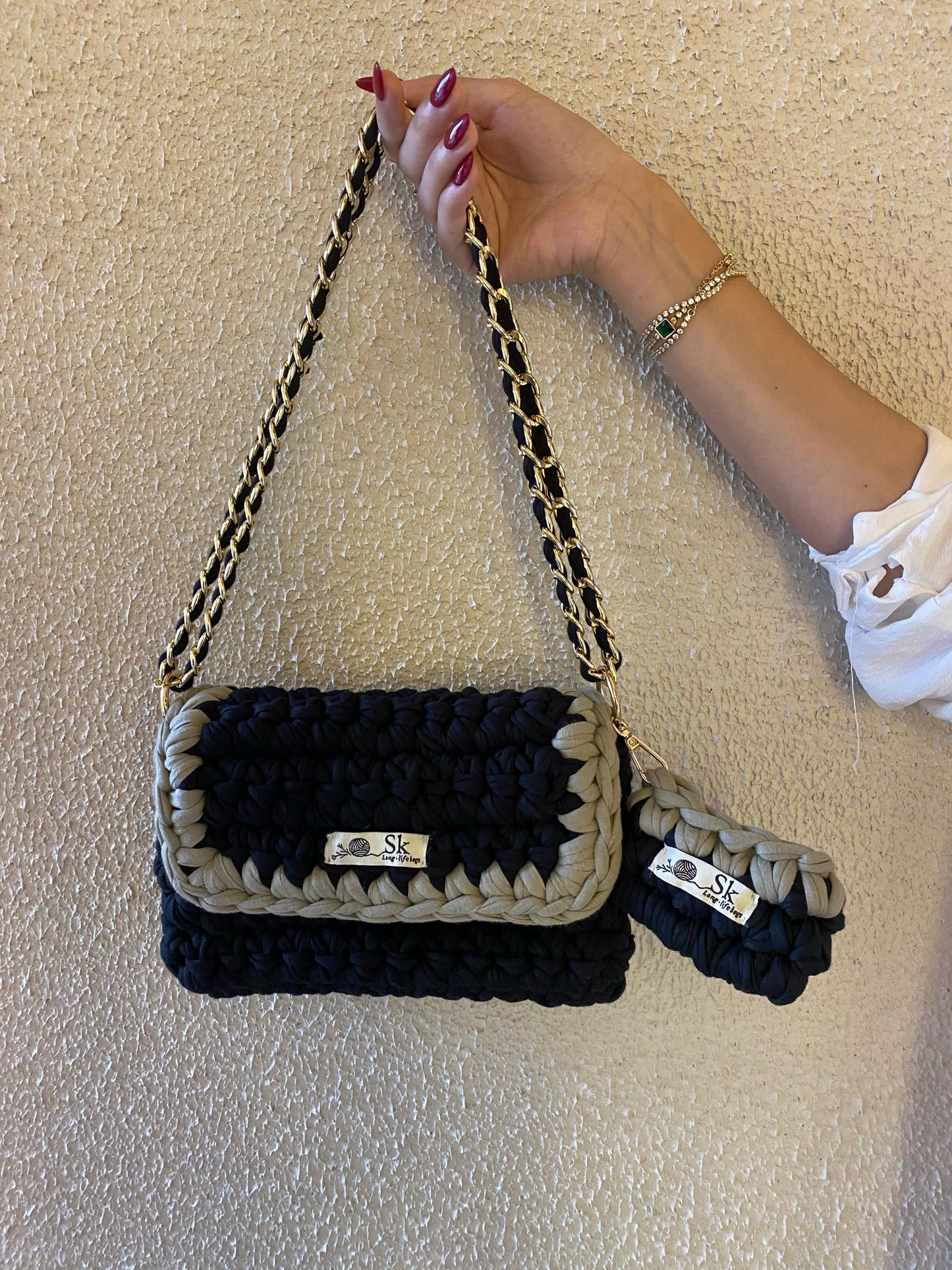 A aclassic hand and shoulder SK bag
