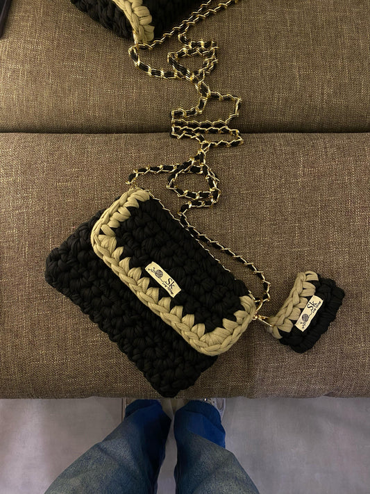 A aclassic hand and shoulder SK bag