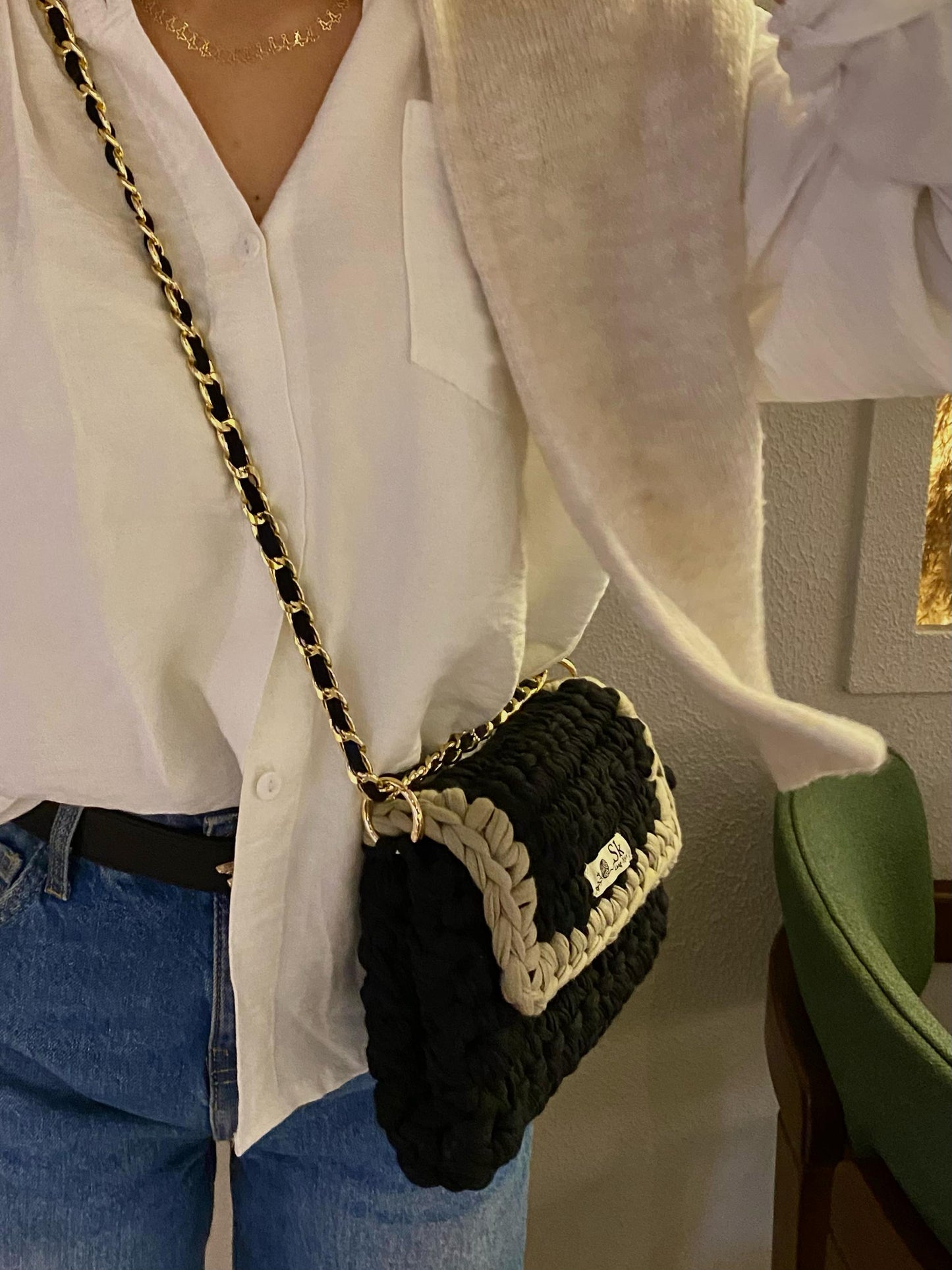 A  aclassic hand and shoulder SK bag