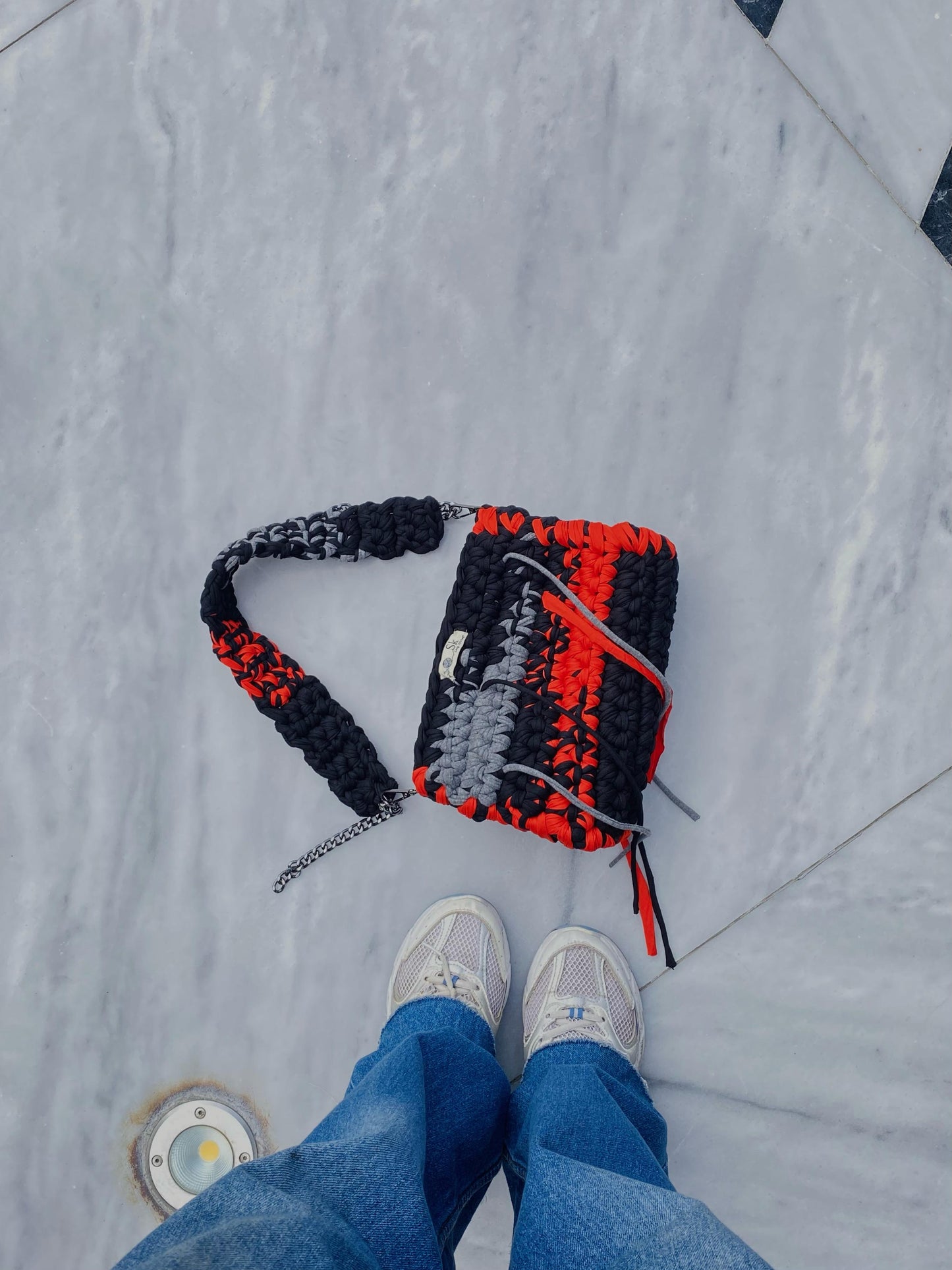 A achunky shoulder and crossy bag