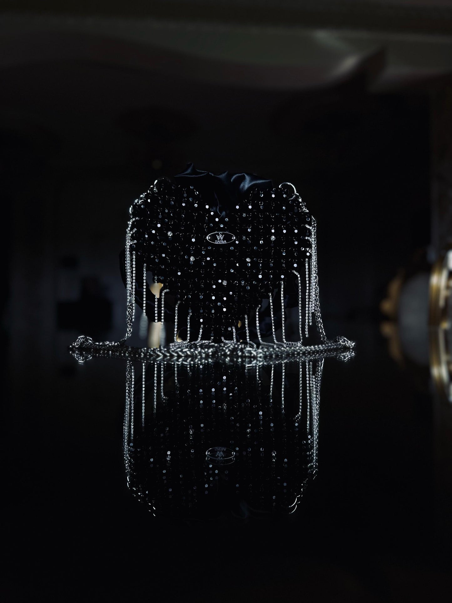 A Black heart-shaped evening bag