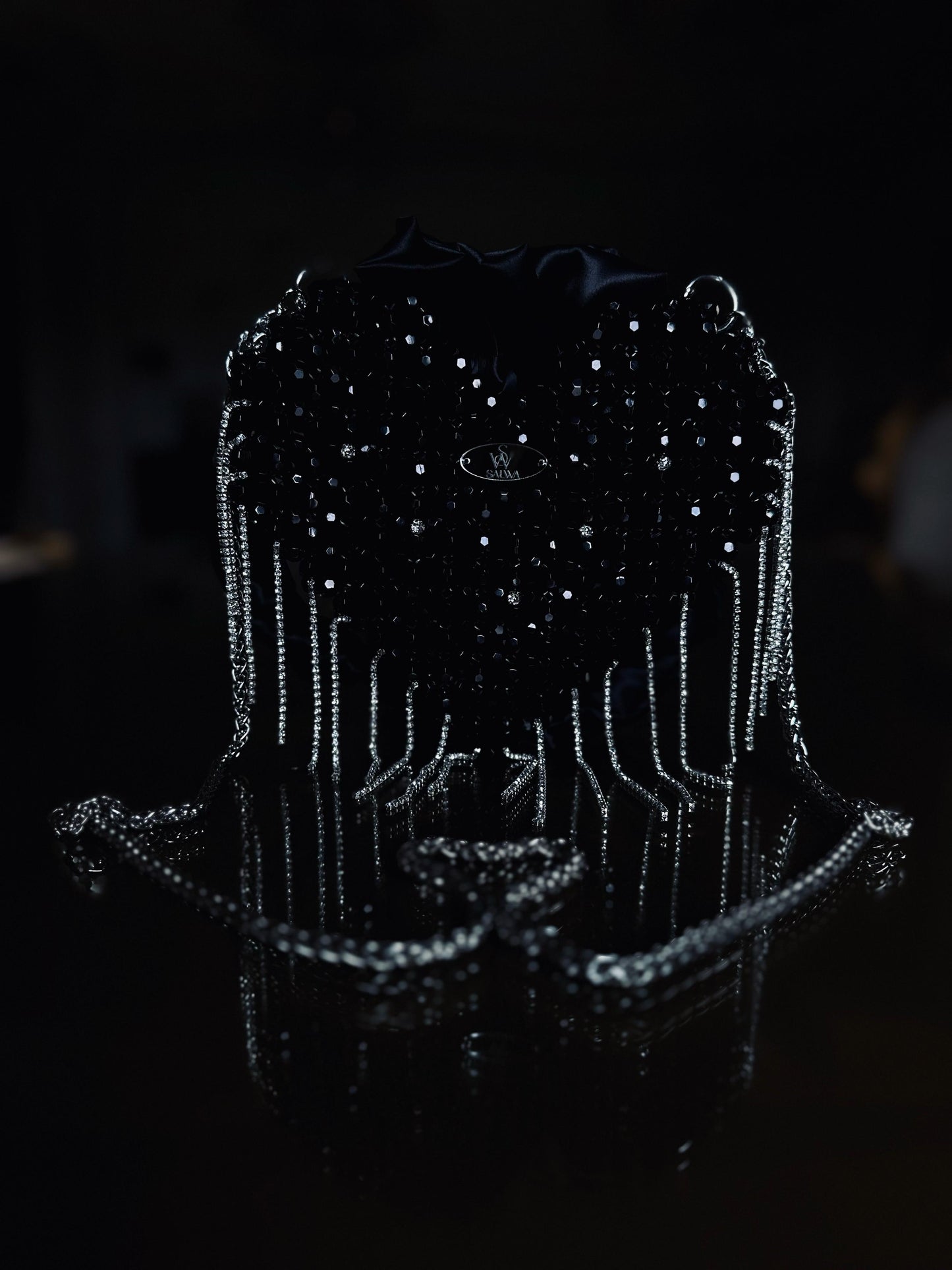 A Black heart-shaped evening bag