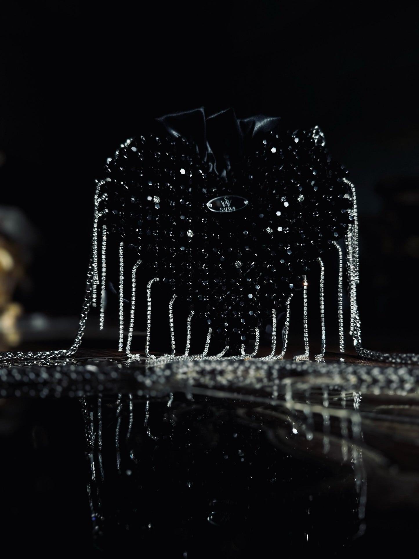 A Black heart-shaped evening bag