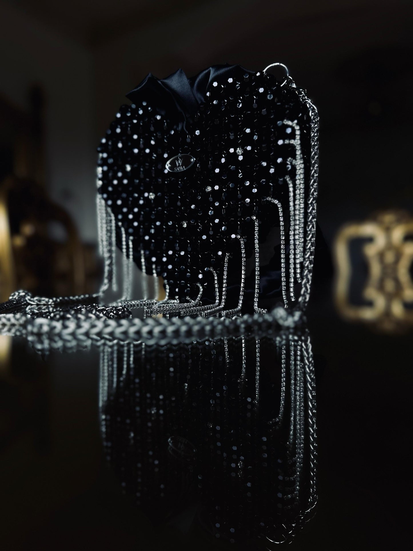 A Black heart-shaped evening bag